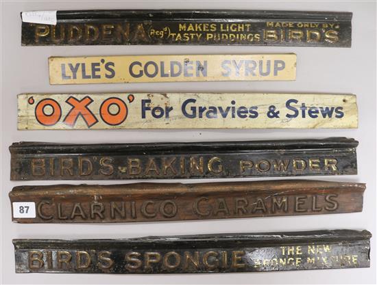 Five shelf advertising signs for Baking Powder, Sponge Mixture, Caramels, Pudding Mix and Oxo approx. length 49cm